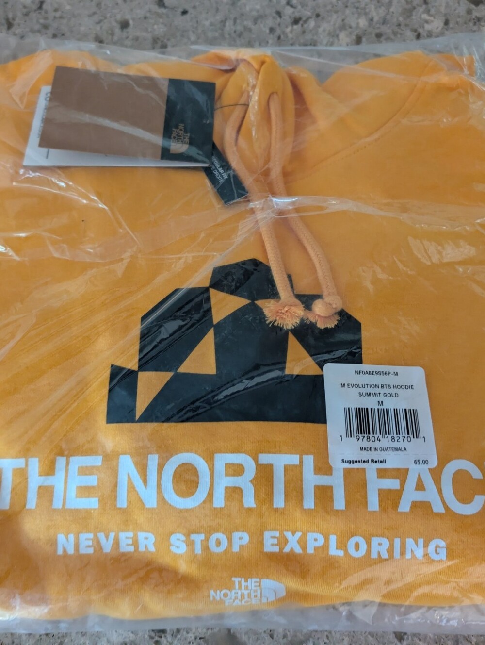 The North Face Summit Gold Pullover Hoodie with Black Logo